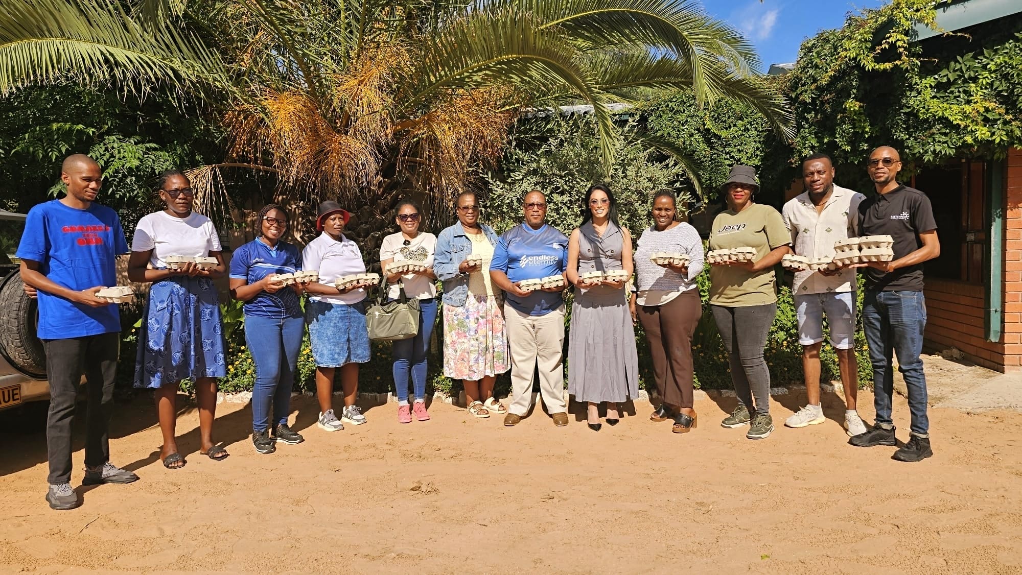 Community members participating in egg distribution program